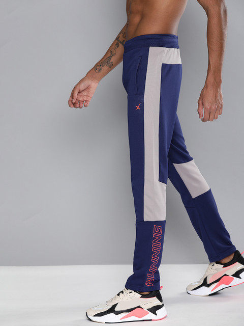 HRX by Hrithik Roshan Men Blue & Grey Slim Colorublocked Rapid-Dry Running Track Pants
HRX by Hrithik Roshan Men Blue & Grey Slim Colorublocked Rapid-Dry Running Track Pants