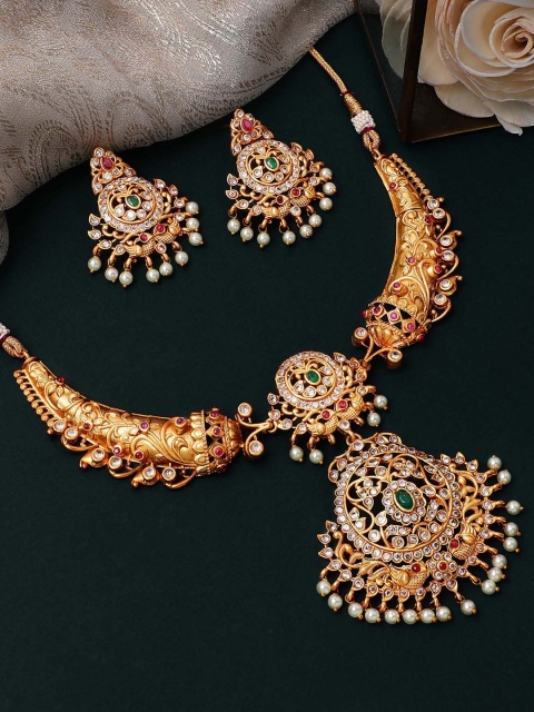 Rubans 22K Gold-Plated & Green Stone-Studded Handcrafted Traditional Temple Jewellery Set
Rubans 22K Gold-Plated & Green Stone-Studded Handcrafted Traditional Temple Jewellery Set