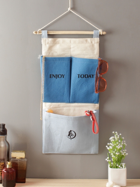 Rajasthan Decor Blue & Beige Colourblocked Multipurpose 3 Pocket Wall Hanging Organiser
Rajasthan Decor Blue & Beige Colourblocked Multipurpose 3 Pocket Wall Hanging Organiser