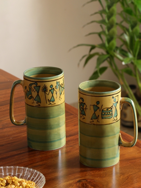 ExclusiveLane Set Of 2 Green & Yellow Handpainted Drink Two Glory Ceramic Beer & Milk Mugs
ExclusiveLane Set Of 2 Green & Yellow Handpainted Drink Two Glory Ceramic Beer & Milk Mugs