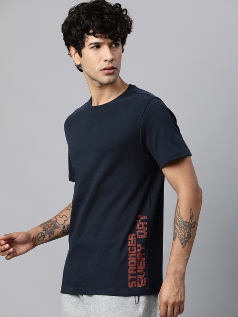 HRX by Hrithik Roshan Men Navy Blue Solid Round Neck T-shirt with Placement Printed Detail
HRX by Hrithik Roshan Men Navy Blue Solid Round Neck T-shirt with Placement Printed Detail