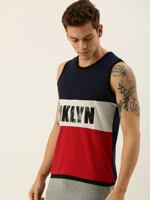Moda Rapido Men Navy Blue & Red Colourblocked Round Neck T-shirt With Printed Detailing
Moda Rapido Men Navy Blue & Red Colourblocked Round Neck T-shirt With Printed Detailing