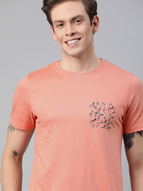 Mast Harbour Men Peach-Coloured Solid Round Neck Pure Cotton T-shirt with Print Detail
Mast Harbour Men Peach-Coloured Solid Round Neck Pure Cotton T-shirt with Print Detail