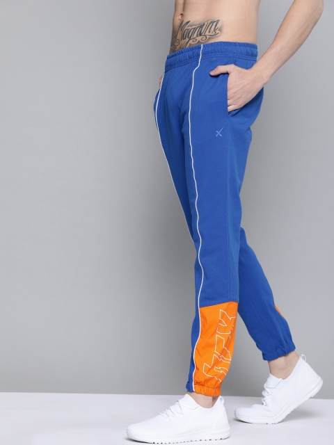 HRX by Hrithik Roshan Men Strong Blue Melange Typographic Slim Fit Lifestyle Joggers
HRX by Hrithik Roshan Men Strong Blue Melange Typographic Slim Fit Lifestyle Joggers