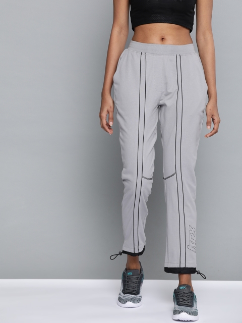 HRX by Hrithik Roshan Women Wet Weather Typographic Antimicrobial Lifestyle Track Pants, Grey
HRX by Hrithik Roshan Women Wet Weather Typographic Antimicrobial Lifestyle Track Pants, Grey