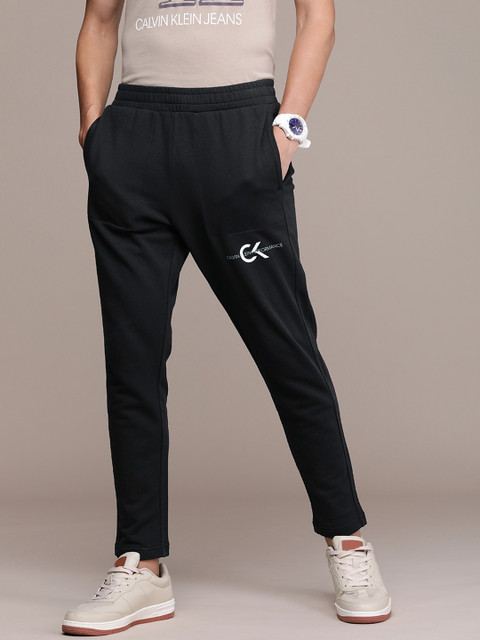 Calvin Klein Jeans Men Black Brand Logo Printed Pure Cotton Track Pants
Calvin Klein Jeans Men Black Brand Logo Printed Pure Cotton Track Pants