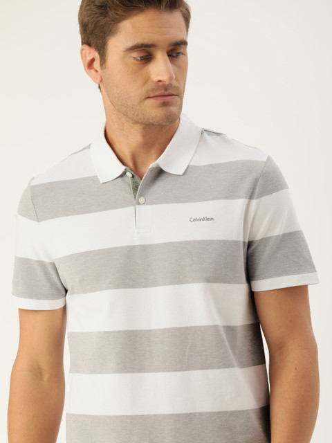 Calvin Klein Jeans Men White Striped Polo Collar Pure Cotton T-shirt 
Calvin Klein Jeans Men White Striped Polo Collar Pure Cotton T-shirt