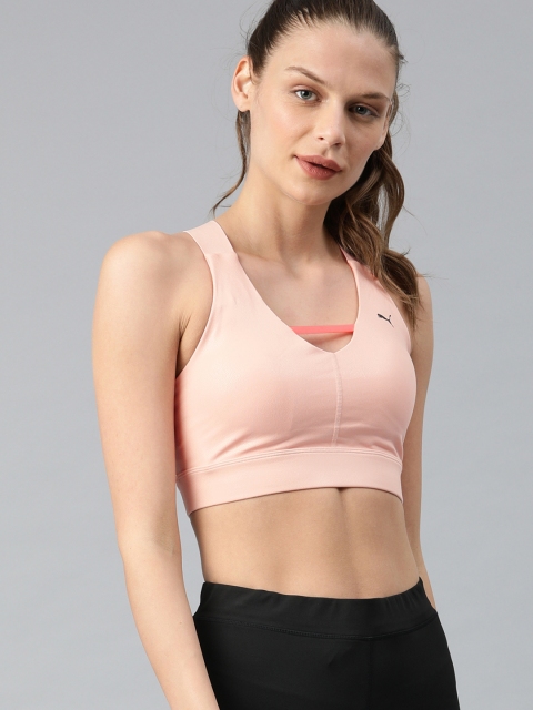 Puma Peach-Coloured Solid Non-Wired Non Padded Mid Impact Pearl Workout Bra 51956303
Puma Peach-Coloured Solid Non-Wired Non Padded Mid Impact Pearl Workout Bra 51956303