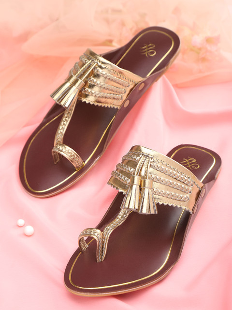 House of Pataudi Women Gold-Toned Braided Handcrafted One Toe Flats with Tassels
House of Pataudi Women Gold-Toned Braided Handcrafted One Toe Flats with Tassels