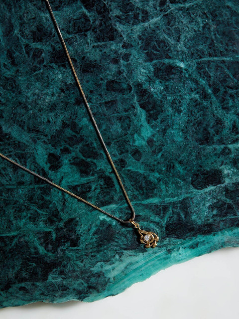 ZeroKaata Gold-Plated AD Studded Handcrafted Necklace
ZeroKaata Gold-Plated AD Studded Handcrafted Necklace