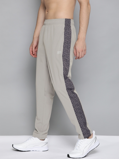 HRX by Hrithik Roshan Men Wet Weather Solid Regular Fit Rapid-Dry Lycra Running Track Pants, Grey
HRX by Hrithik Roshan Men Wet Weather Solid Regular Fit Rapid-Dry Lycra Running Track Pants, Grey