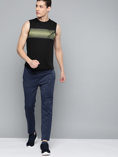 HRX by Hrithik Roshan Men Medieval Blue Solid Regular Fit Rapid-Dry Running Track Pants, Navy blue
HRX by Hrithik Roshan Men Medieval Blue Solid Regular Fit Rapid-Dry Running Track Pants, Navy blue