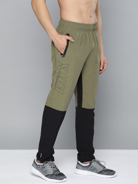HRX by Hrithik Roshan Men Olive Green & Black Colourblock Rapid-Dry Training Track Pants
HRX by Hrithik Roshan Men Olive Green & Black Colourblock Rapid-Dry Training Track Pants