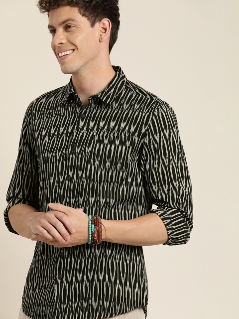 Taavi Men Black & Beige Regular Fit Ikat Woven Design Casual Shirt with Patch Pocket
Taavi Men Black & Beige Regular Fit Ikat Woven Design Casual Shirt with Patch Pocket