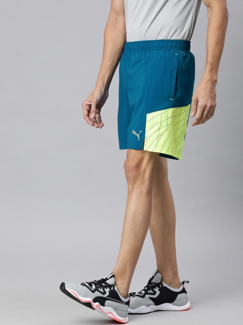 Puma Men Blue & Green Colourblocked Regular Fit Dry-Cell Run Graphic Woven 7 Sports Shorts
Puma Men Blue & Green Colourblocked Regular Fit Dry-Cell Run Graphic Woven 7 Sports Shorts