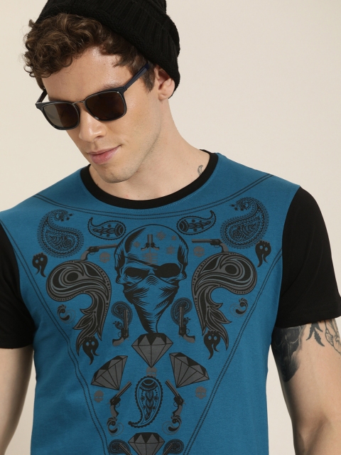 Moda Rapido Men Teal Blue & Black Graphic Printed Round Neck T-shirt With Contrast Sleeves
Moda Rapido Men Teal Blue & Black Graphic Printed Round Neck T-shirt With Contrast Sleeves