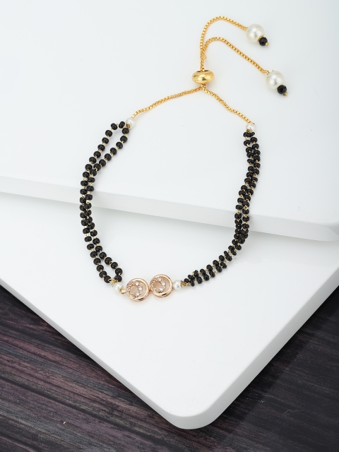 Carlton London Black Gold-Plated Beaded & CZ-Studded Handcrafted Mangalsutra Bracelet
Carlton London Black Gold-Plated Beaded & CZ-Studded Handcrafted Mangalsutra Bracelet