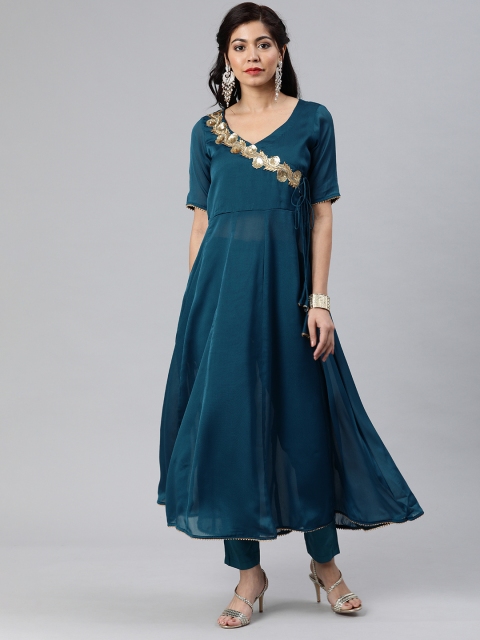 Inddus Women Green Embroidered Kurta with Trousers