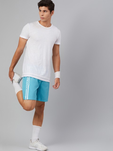 HRX By Hrithik Roshan Men Peacock Blue Typographic Mid-Rise Rapid-Dry Racketsport Shorts
HRX By Hrithik Roshan Men Peacock Blue Typographic Mid-Rise Rapid-Dry Racketsport Shorts