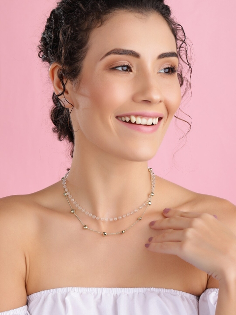 Tokyo Talkies X Rubans Gold Plated Handcrafted White Beads Layered Pendant with Chain
Tokyo Talkies X Rubans Gold Plated Handcrafted White Beads Layered Pendant with Chain