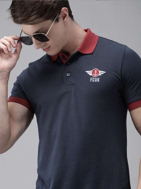 French Connection Men Navy Blue Solid Polo Collar T-shirt with Brand Logo Embroidery
French Connection Men Navy Blue Solid Polo Collar T-shirt with Brand Logo Embroidery