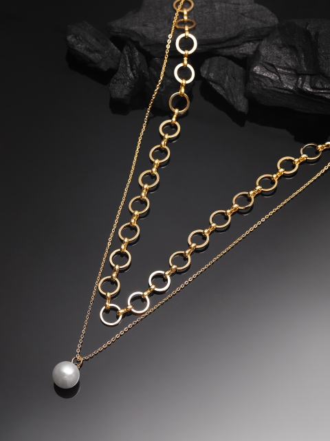 Tokyo Talkies X Rubans Gold Plated Handcrafted White Pearl Layered Pendant with Chain
Tokyo Talkies X Rubans Gold Plated Handcrafted White Pearl Layered Pendant with Chain