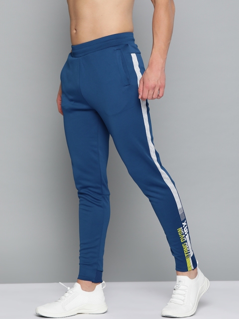 HRX By Hrithik Roshan Men Mazarine Blue Solid Slim Fit Rapid-Dry Antimicrobial Training Joggers
HRX By Hrithik Roshan Men Mazarine Blue Solid Slim Fit Rapid-Dry Antimicrobial Training Joggers