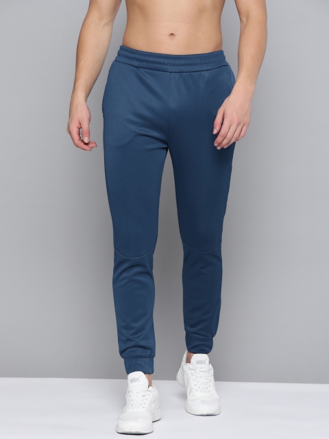 HRX By Hrithik Roshan Men Estate Blue Abstract Slim Fit Rapid-Dry Antimicrobial Training Joggers
HRX By Hrithik Roshan Men Estate Blue Abstract Slim Fit Rapid-Dry Antimicrobial Training Joggers