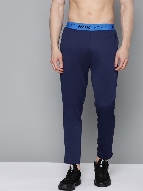 HRX By Hrithik Roshan Men Estate Blue Solid Tappered Fit Antimicrobial Running Track Pants, Navy blue
HRX By Hrithik Roshan Men Estate Blue Solid Tappered Fit Antimicrobial Running Track Pants, Navy blue