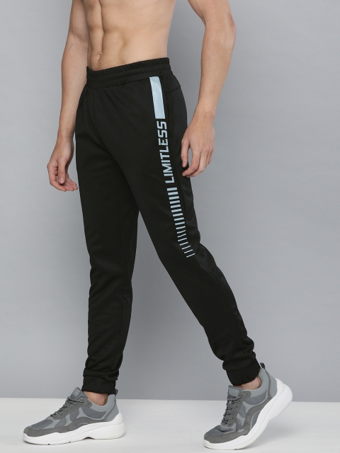 HRX By Hrithik Roshan Men Wet Weather & Jet Black Solid Slim Fit Antimicrobial Running Joggers
HRX By Hrithik Roshan Men Wet Weather & Jet Black Solid Slim Fit Antimicrobial Running Joggers