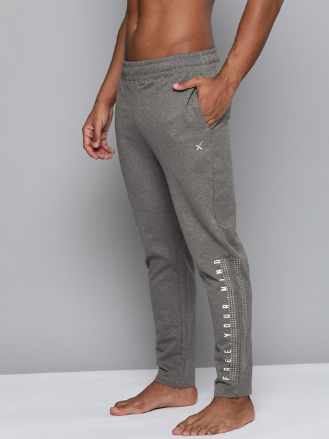 HRX By Hrithik Roshan Men Anthra Melange Typographic Regular Fit Bio-Wash Antimicrobial Yoga Track Pants, Grey melange 
HRX By Hrithik Roshan Men Anthra Melange Typographic Regular Fit Bio-Wash Antimicrobial Yoga Track Pants, Grey melange