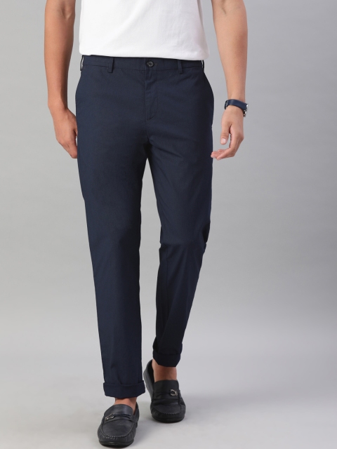 Tommy Hilfiger Men Navy Slim Fit Micro Ditsy Print Flex Smart Casual Trousers, Navy blue
Tommy Hilfiger Men Navy Slim Fit Micro Ditsy Print Flex Smart Casual Trousers, Navy blue