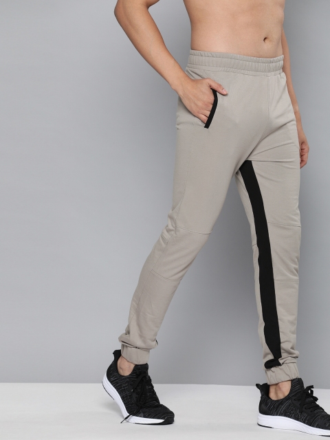 HRX By Hrithik Roshan Men Wet Weather Colourblock Slim Fit Rapid-Dry Antimicrobial Training Joggers, Beige
HRX By Hrithik Roshan Men Wet Weather Colourblock Slim Fit Rapid-Dry Antimicrobial Training Joggers, Beige