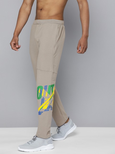 HRX By Hrithik Roshan Men Wet Weather Solid Slim Fit Lycra Bio-Wash Gold Finish Lifestyle Track Pants, Beige
HRX By Hrithik Roshan Men Wet Weather Solid Slim Fit Lycra Bio-Wash Gold Finish Lifestyle Track Pants, Beige