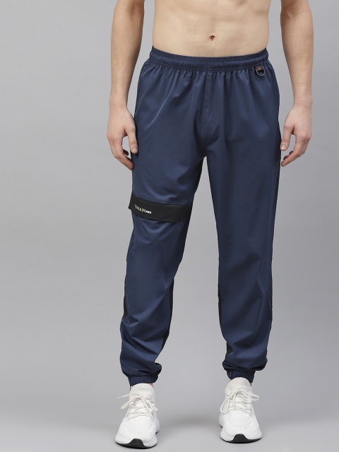 HRX By Hrithik Roshan Men Medival Blue & Jet Black Colourblock Rapid-Dry Outdoor Joggers, Navy blue
HRX By Hrithik Roshan Men Medival Blue & Jet Black Colourblock Rapid-Dry Outdoor Joggers, Navy blue