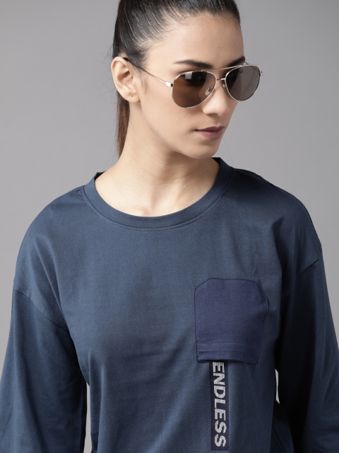 The Roadster Lifestyle Co Women Navy Blue Printed Detail Boxy Pure Cotton Round Neck T-shirt
The Roadster Lifestyle Co Women Navy Blue Printed Detail Boxy Pure Cotton Round Neck T-shirt