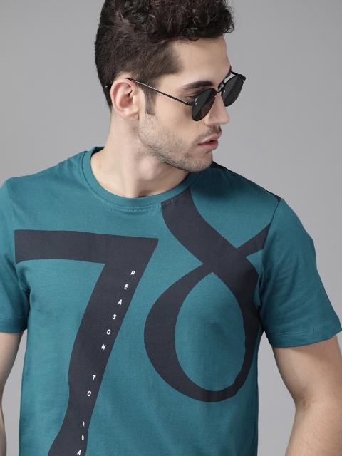 The Roadster Lifestyle Co Men Teal Blue & Black Printed Round Neck Pure Cotton T-shirt
The Roadster Lifestyle Co Men Teal Blue & Black Printed Round Neck Pure Cotton T-shirt