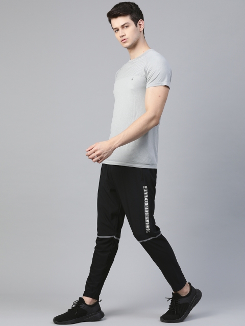 HRX By Hrithik Roshan Men Jet Black Typographic Hybrird Rapid-Dry Training Track Pants
HRX By Hrithik Roshan Men Jet Black Typographic Hybrird Rapid-Dry Training Track Pants