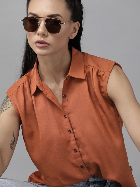 The Roadster Lifestyle Co Women Rust Orange Sustainable Recycled Polyester Solid Sleeveless Shirt
The Roadster Lifestyle Co Women Rust Orange Sustainable Recycled Polyester Solid Sleeveless Shirt