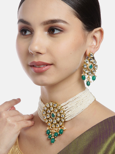 Melani Borsa Green & Off-White Gold-Plated Kundan-Studded & Beaded Jewellery Set
Melani Borsa Green & Off-White Gold-Plated Kundan-Studded & Beaded Jewellery Set