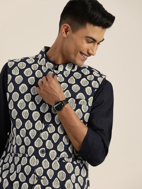 Taavi Men Navy Blue & White Indigo Hand Block Printed Nehru Jacket With Mandarin Collar
Taavi Men Navy Blue & White Indigo Hand Block Printed Nehru Jacket With Mandarin Collar