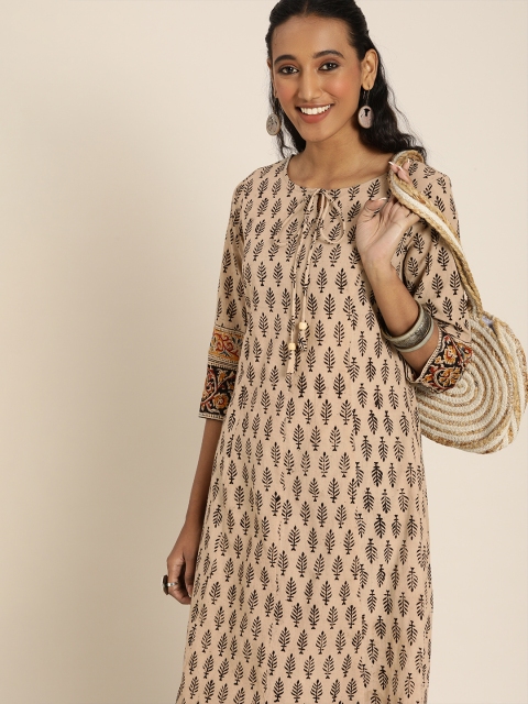 Taavi Women Beige & Black Kalamkari Hand Block Print Sustainable A-Line Kurta With Tie-Up
Taavi Women Beige & Black Kalamkari Hand Block Print Sustainable A-Line Kurta With Tie-Up