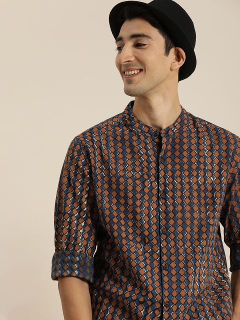 Taavi Men Navy Blue & Rust Brown Indigo Hand Block Printed Shirt with Mandarin Collar
Taavi Men Navy Blue & Rust Brown Indigo Hand Block Printed Shirt with Mandarin Collar