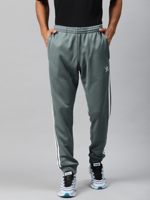 ADIDAS Originals Men Grey Solid Slim Tapered Pure Cotton Joggers With Side Stripe Taping
ADIDAS Originals Men Grey Solid Slim Tapered Pure Cotton Joggers With Side Stripe Taping
