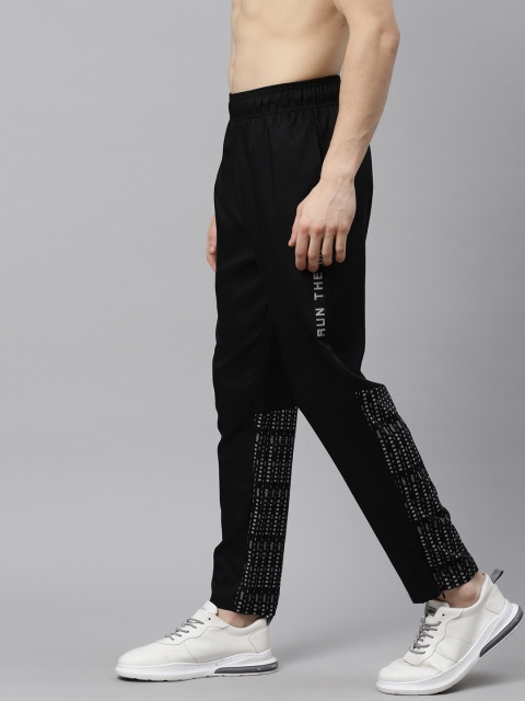 HRX By Hrithik Roshan Men Black Typographic Slim Mid-Rise Rapid-Dry Running Track Pants
HRX By Hrithik Roshan Men Black Typographic Slim Mid-Rise Rapid-Dry Running Track Pants