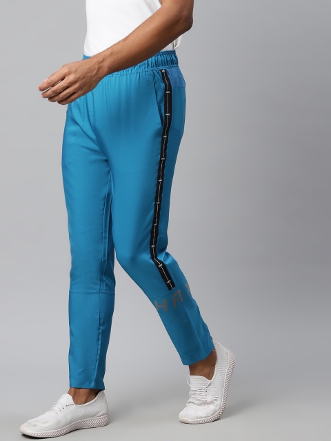 HRX by Hrithik Roshan Men Blue Solid Slim Fit Rapid-Dry Antimicrobial Running Track Pants
HRX by Hrithik Roshan Men Blue Solid Slim Fit Rapid-Dry Antimicrobial Running Track Pants