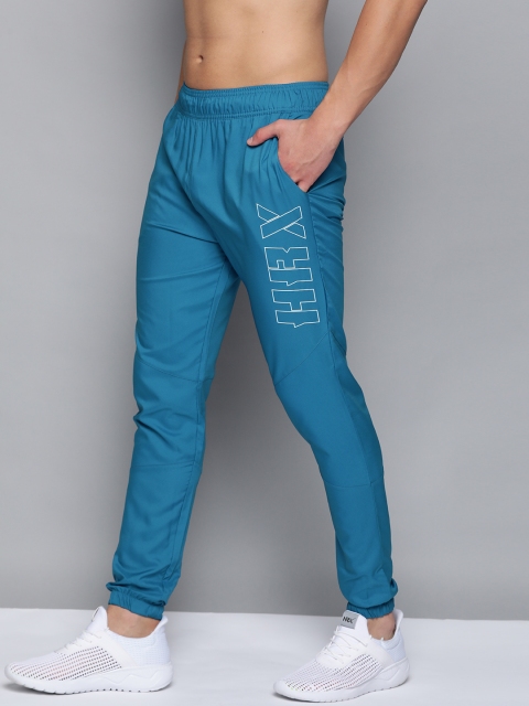 HRX By Hrithik Roshan Men Blue Beast Solid Slim Fit Rapid-Dry Antimicrobial Anti-Static Training Track Pants
HRX By Hrithik Roshan Men Blue Beast Solid Slim Fit Rapid-Dry Antimicrobial Anti-Static Training Track Pants
