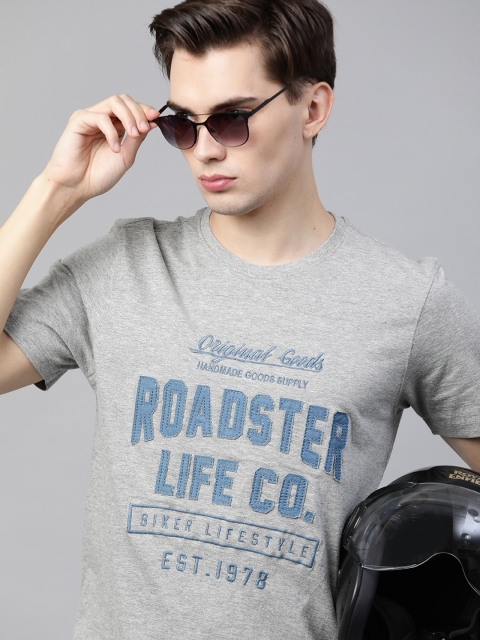 The Roadster Lifestyle Co Men Grey Melange & Blue Brand Logo Appliqued Pure Cotton T-shirt
The Roadster Lifestyle Co Men Grey Melange & Blue Brand Logo Appliqued Pure Cotton T-shirt