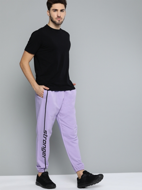 HRX By Hrithik Roshan Men Violet Tulip Typographic Regular Fit Bio-Wash Lifestyle Joggers, Lavender
HRX By Hrithik Roshan Men Violet Tulip Typographic Regular Fit Bio-Wash Lifestyle Joggers, Lavender