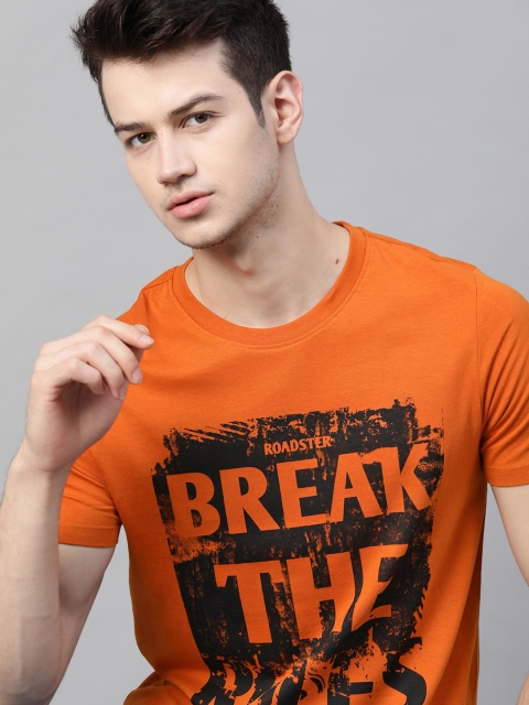 Roadster Men Orange Navy Blue Pure Cotton Typography Printed Round Neck Pure Cotton T-shirt
Roadster Men Orange Navy Blue Pure Cotton Typography Printed Round Neck Pure Cotton T-shirt